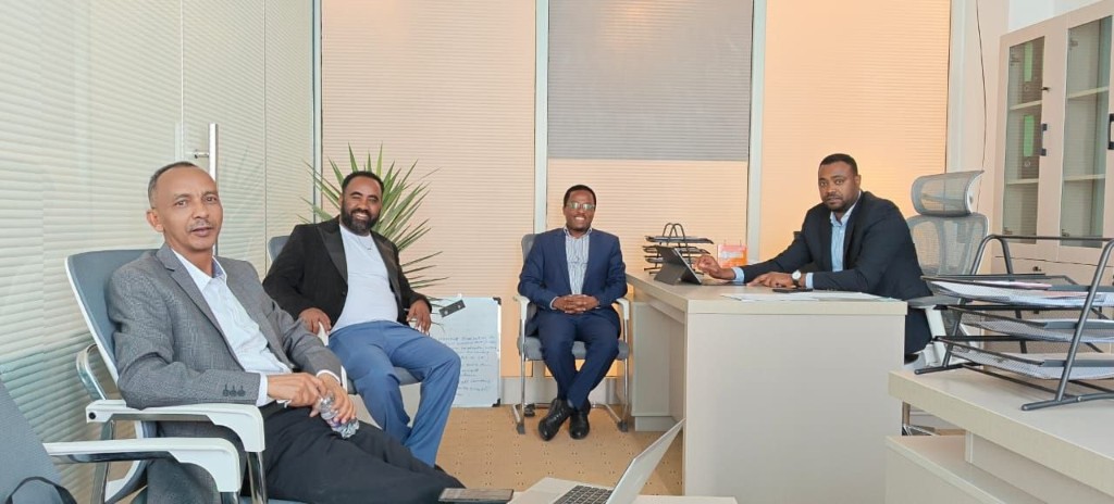 YOSAM professionals meeting in a modern office workspace